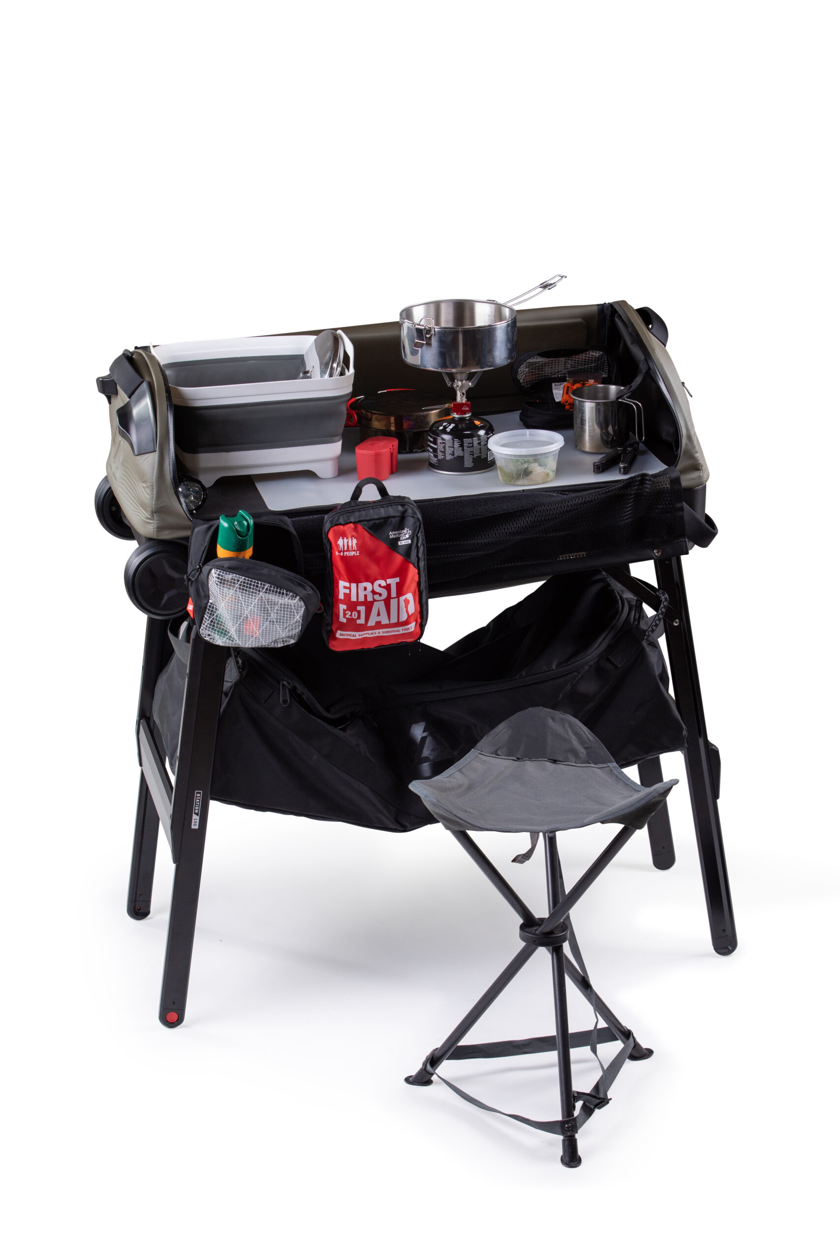 Station 150 duffle bag deployed as a table, loaded with camping equipment with a fold out seat in front.